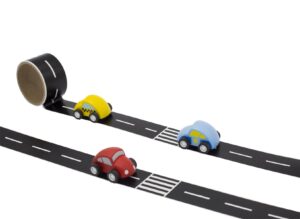 Wide black tape with white centre lane and zebra crossings. Shown with wooden cars with simple wooden cars with wheels.