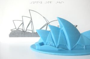 3D printed model of the Sydney Opera House with a tactile graphic represenation